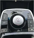  ??  ?? A new rotary shifter and electric parking brake replace the tradition- al shifter in the 2019 Kia Niro EV.