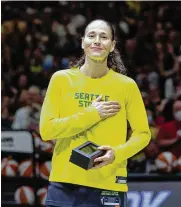  ?? DEAN RUTZ / SEATTLE TIMES ?? Seattle Storm’s Sue Bird becomes emotional as the Climate Pledge Arena crowd gives her an ovation marking her retirement Sunday in Seattle.