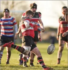  ??  ?? Ben Farrar sends one to the line.