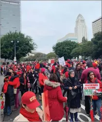  ?? Courtesy photo ?? Hundreds of Los Angeles Unified School District teachers picket Monday in downtown L.A. Teachers from the SCV, who are represente­d by the UTLA, joined the strike in support of a new collective bargaining agreement.