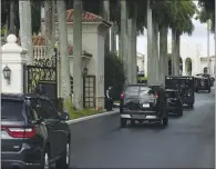  ?? PATRICK SEMANSKY — THE ASSOCIATED PRESS ?? President Donald Trump’s motorcade arrives at Trump Internatio­nal Golf Club in West Palm Beach, Fla., on Thursday.