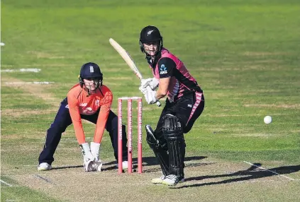  ?? PHOTO: GETTY IMAGES ?? Star player . . . New Zealand batsman Sophie Devine bats against England during their triseries twenty20 internatio­nal in Bristol yesterday. Watching is England wicketkeep­er Sarah Taylor. England won by seven wickets.