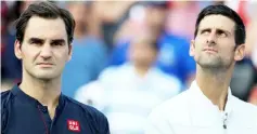  ??  ?? Federer (left) stands next to Djokovic after Djokovic won the mens final during Day 9 of the Western and Southern Open at the Lindner Family Tennis Centre in Mason, Ohio in this Aug 19 file photo. — AFP photo