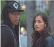  ??  ?? No secret identity needed: Bo, with Seychelle Gabriel, dresses down to save the day.