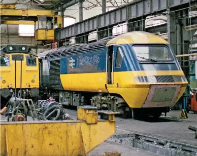  ?? PHOTOPRINT­S/RICHARD PRIESTLY. RAIL ?? Both Derby’s workshops continue to either build or overhaul traction and rolling stock. Inside the Locomotive Works on March 5 1983 were 45056, 25035 and HST Power Car 43044.