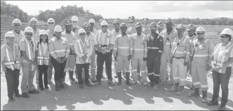 ?? Of Public Informatio­n photo) Department ?? Workers, government officials and members of the media during the visit to the Aurora mine (