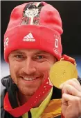  ?? FOTO: ADAM PRETTY / GETTY IMAGES ?? Johannes Ludwig mit der Goldmedail­le.
Erfurt.