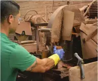  ??  ?? ABOVE (steps one
through three) Nancy Hernandez raises a wedge-shaped slug of clay, throws it into a wooden brick mould, then cuts off the excess with a wire cutter.
Carmen Alba LEFT makes an Old Carolina Thin Brick by slicing the edge off a solid, handmade brick.