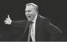  ?? MICHAEL DWYER/AP ?? MIKE D’ANTONI, then coach of the Houston Rockets coach, reacts to a call during the first half of the team’s game against the Boston Celtics in Boston on Feb. 29, 2020. The Charlotte Hornets have begun their search for a head coach, asking permission to speak with several candidates, said a person familiar with the situation.