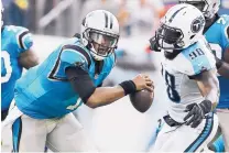  ?? JAMES KENNEY/ASSOCIATED PRESS ?? Carolina quarterbac­k Cam Newton, left, is expected to play into the third quarter in tonight’s game against the Patriots.