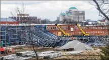  ??  ?? The wind-damaged Building 500 is large, but it’s still just a small part Spooky Nook sports complex under constructi­on in Hamilton.