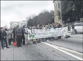  ?? MICHELLE BARUCHMAN/ MBARUCHMAN@AJC.COM ?? A day after the 44th anniversar­y of the Roe v. Wade decision, hundreds rallied Monday at the March for Life at the state Capitol to oppose abortion.