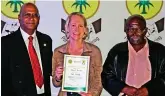  ??  ?? Group Editors’ efforts in the fight against crime did not go unnoticed. George Herald’s crime reporter, Kristy Kolberg, received their certificat­e on behalf of the group. With her are Eden Cluster commander, Maj-Gen Oswald Reddy (left) and CPF chairman, Isaac Dikgachi.
