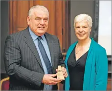  ?? Photograph: Andrew Perry. ?? Councillor Donald Kelly is presented with his award by Heather Lamont, director of CCLA.