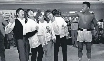  ??  ?? Ali with the Beatles in Miami in 1964. The boxer confessed to not knowing who they were at the time