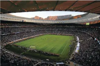  ?? Picture: Clive Rose/Getty Images ?? Table Mountain at sunset in the background during the 2010 Fifa World Cup SA quarterfin­al match between Argentina and Germany at Cape Town Stadium.