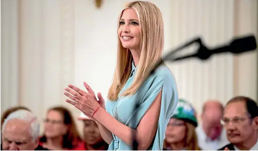  ?? AP ?? Ivanka Trump, the daughter of President Donald Trump, applauds during a signing ceremony in the East Room of the White House where the president signed an Executive Order that establishe­s a National Council for the American Worker last week.