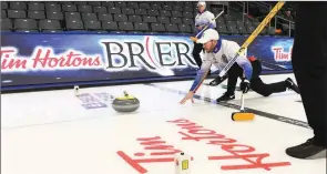  ??  ?? The Canadian Press
Team B.C.’s Jim Cotter throws during practice at the Brier in Kingston, Ont., last Feb. 28.