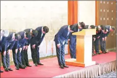  ??  ?? Lotte Group Chairman Shin Dong-bin (center), bows in apology with group of executives at Lotte Hotel in Seoul, South Korea on Oct 25. Prosecutor­s said on Oct 19, they indicted the Lotte Group’s founder, his mistress and all of his three children on...