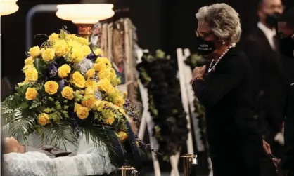  ?? Photograph: Joshua A Bickel/AP ?? Congresswo­man Joyce Beatty pays her respects at the casket of Andre Hill during his funeral on Tuesday at First Church of God in Columbus, Ohio.