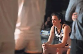  ?? ?? Iowa’s Caitlin Clark waits to be announced before an NCAA Tournament game against West Virginia on March 25.