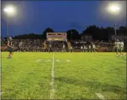  ?? DIGITAL FIRST MEDIA FILE PHOTO ?? Pottstown hosted Friday night football under the lights for the first time since 2013 Friday night when the Trojans faced Bishop Shanahan.