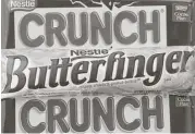  ?? Mark Lennihan / Associated Press file ?? Nestlé says its candy business in the United States has waned as fewer Americans have displayed an appetite for sweets.