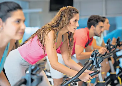  ??  ?? Spin to win: gym-goers are increasing­ly pitted against each other