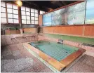  ?? STÉPHANIE CROHIN THE ASSOCIATED PRESS ?? Traditiona­l baths and murals in Ayame-yu sento, or public bath, in Izunagaoka, Shizuoka prefecture.