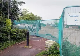  ??  ?? The entrance to the footpath linking Shute End car park to Elms Road. It has been closed after a woman was raped there on Monday, May 28