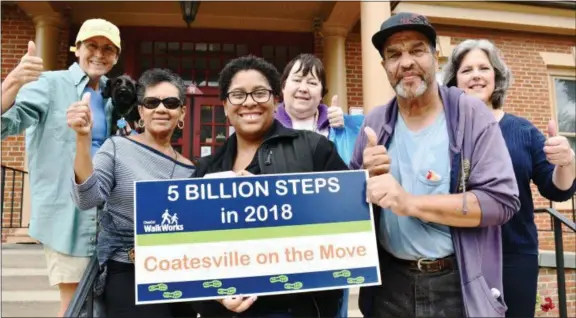  ?? SUBMITTED PHOTO ?? “Coatesvill­e on the Move” team members finished the poker walking challenge at the steps of the Coatesvill­e Library.