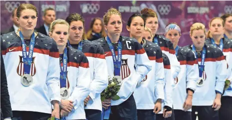  ?? RICHARD MACKSON, USA TODAY SPORTS ?? The U.S. women’s team earned the silver medal in the 2014 Sochi Olympics, falling 3-2 to Canada in overtime.