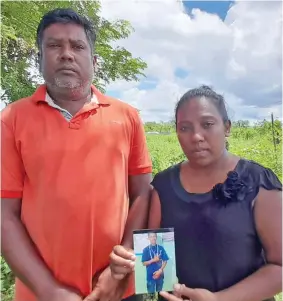  ?? Photo: Mereleki Nai ?? Worried parents Surend Kumar (left) and Saroshni Kumar at Aladatta settlement in Nadi.