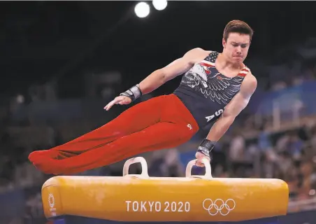  ?? Patrick Smith / Getty Images ?? Stanford’s Brody Malone of Team USA competes on pommel horse during the men’s team final at Ariake Gymnastics Centre.