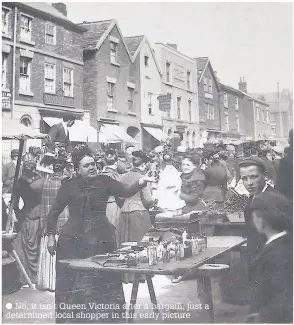  ?? No, it isn’t Queen Victoria after a bargain, just a determined local shopper in this early picture ??