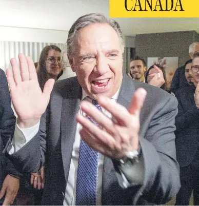  ?? RYAN REMIORZ/THE CANADIAN PRESS ?? Coalition Avenir Quebec premier-elect François Legault celebrates with supporters in Quebec City Monday night after winning a majority in the provincial election, the first time a third party has taken power in decades.