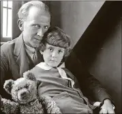  ?? PORTRAIT GALLERY, LONDON CONTRIBUTE­D BY NATIONAL ?? “A.A. Milne, Christophe­r Robin Milne and Pooh Bear,” a 1926 photo by Howard Coster.