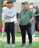  ?? MARK HOFFMAN/MILWAUKEE JOURNAL SENTINEL ?? Packers general manager Brian Gutekunst, right, is encouraged by the competitio­n among a large draft class. He’s shown at spring activities with head coach Matt LaFleur.