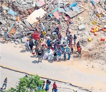  ??  ?? DISASTER: An aerial image from the MoD of some of the earthquake damage in Haiti.