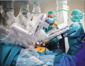  ??  ?? A robo-doc can perform better surgery than a human