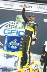  ??  ?? Blaney celebrates in victory lane after winning Monday.