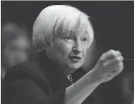  ?? WIN MCNAMEE / GETTY IMAGES ?? U.S. Fed chair Janet Yellen tells Congress Thursday “it is fully my intention to serve out” her term to 2018.