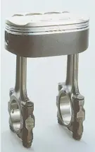  ?? ?? The oval piston, above, with dual connecting roads, from Honda's NR engine. Below, 1992 Honda NR piston detail.