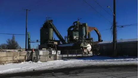  ?? RENÉ JOHNSTON/TORONTO STAR ?? The plant sits near the corner of Ingram Dr. and Sheffield St. in an area zoned for industrial use. The edge of the nearest residentia­l neighbourh­ood is almost 500 metres away. A long-term care facility sits closer, less than 400 metres away.