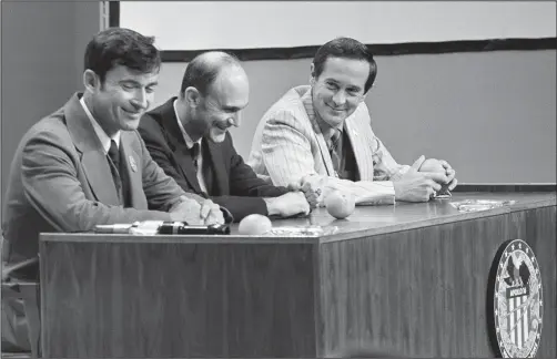  ?? ?? Apollo 16 astronauts John Young (from left), commander; Ken Mattingly, command module pilot; and Duke, lunar module pilot, enjoy a laugh May 3, 1972, at the start of their news conference at the Manned Spacecraft Center in Houston.
(File Photo/AP)