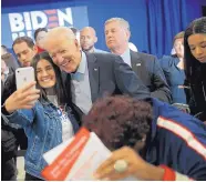  ?? JOHN LOCHER/ASSOCIATED PRESS ?? Democratic presidenti­al candidate former Vice President Joe Biden poses for a selfie at a campaign event in Las Vegas, Nevada, on Nov. 16.