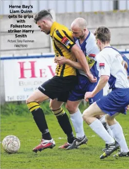  ?? Picture: Tony Flashman FM4275093 ?? Herne Bay’s Liam Quinn gets to grips with Folkestone striker Harry Smith