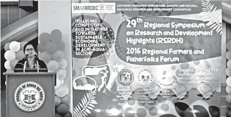  ?? CONTRIBUTE­D PHOTO ?? DR. LOURDES Generalao, vice chair of Smaarrdec and president of University of Southeaste­rn Philippine­s, explains the aim of the Regional Symposium on Research and Developmen­t Highlights organized by Smaardec.