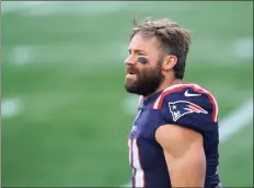  ?? Charles Krupa / Associated Press ?? Patriots receiver Julian Edelman is shown before Sunday’s game against the 49ers. Edelman had a surgical procedure on his knee this week but coach Bill Belichick thinks Edelman will return this season.