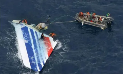  ?? Photograph: Brazilian Navy/AFP/Getty ?? Brazilian navy divers recovering part of the rudder of the Air France A330 aircraft lost over the Atlantic ocean in 2009.